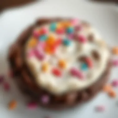 Close-up of a decadent chocolate cookie with frosting and sprinkles, perfect for celebrations.