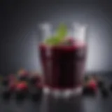 Nutrient-rich mulberry juice in a glass with fresh mulberries