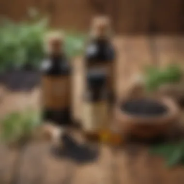 A variety of herbal bottles including black seed oil on a wooden surface