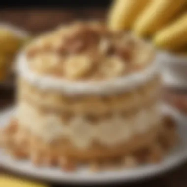 Close-up view of a decadent banana dessert topped with nuts and fresh fruit.