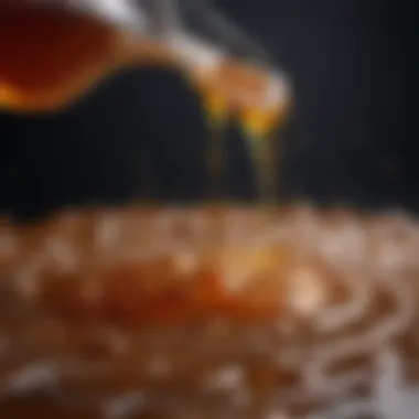 A close-up of syrup being poured over kadayıf